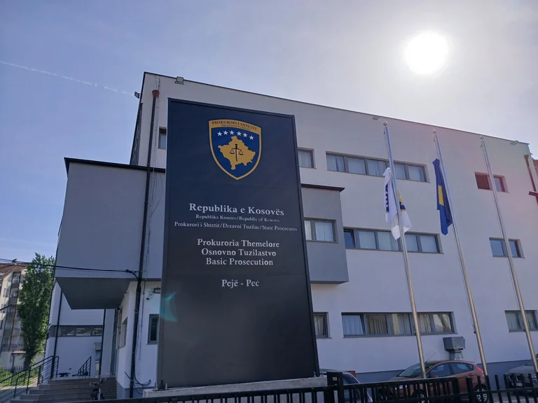 Charged against two police officials suspected of accepting bribes