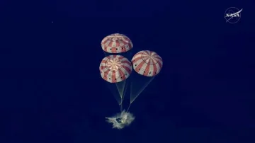 The dramatic moment when Artemis II lands in the Pacific after the historic mission