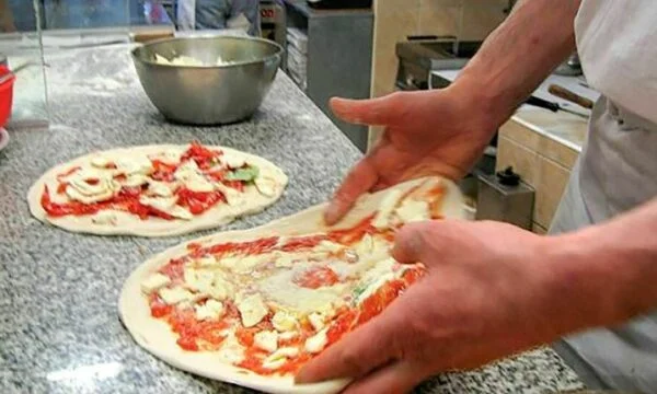Iz Nemčije je šel v Italijo oropat pizzerino, albansko 34-letno aretacijo.