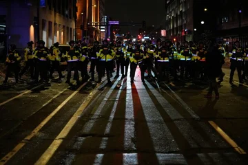 Po umoru ženske v Minneapolisu po vsej Ameriki.