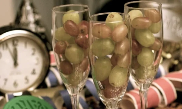 What happens if you eat 12 grapes under the table for New Year's Eve?
