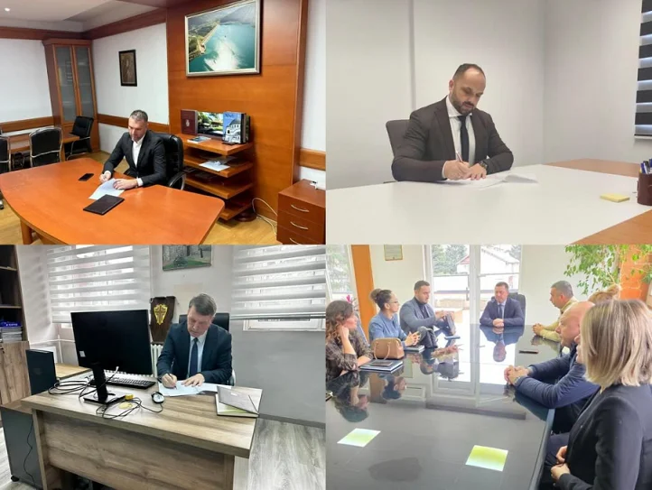 Sırp Belediye Başkanı Zubin Potok Kosova bayrağını kaldırıyor, başkanın fotoğrafı ofisden