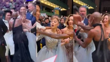 Ariana Grande attackeras i premiären av filmen i Singapore, säkerhet ingriper på fans identifiera mannen som släpade på henne