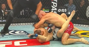 スキャンダルi UFC: 裁判官は試合を中止し、その後、彼の心を変更し、ファンは却下のために呼び出します