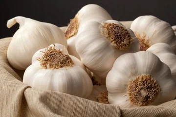 What happens in the organism if you eat a garlic aid at dinner