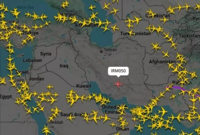 The only plane on Tehran is followed by thousands of people