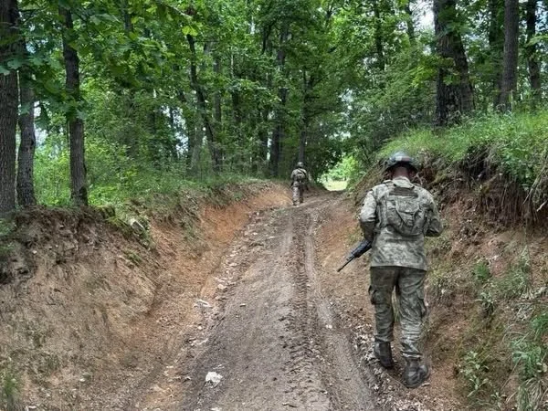 Turkish KFOR soldiers patrol along border line