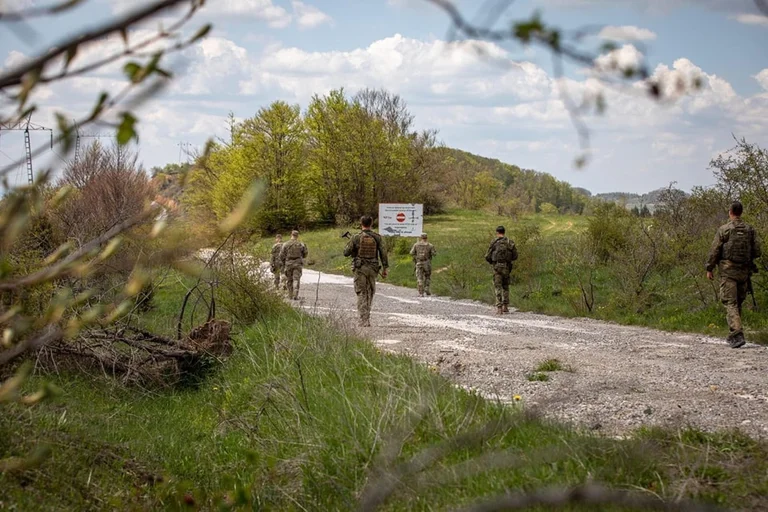 KFOR publishes images of American and German soldiers patrolling
