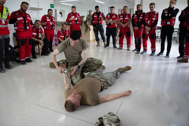 American soldiers train Peace Research Association for first fire and aid