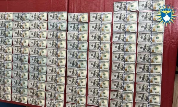 Page/ One suspect in counterfeiting money is arrested, $9,000 is seized.