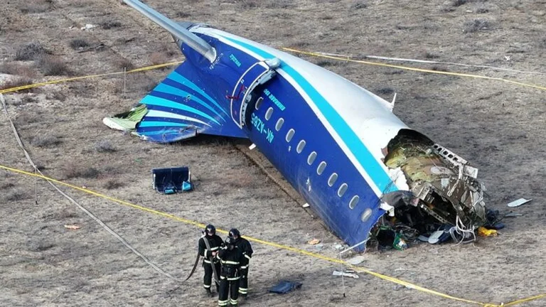 Azerbaijani minister says plane crash hit with gun