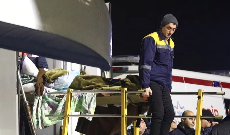 Some survivors return to Azerbaijan as authorities seek cause of plane crash