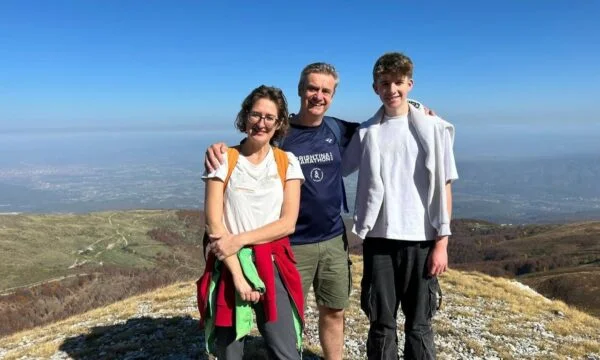 The British Ambassador ascends to the top of Luboten, setting a purpose for himself