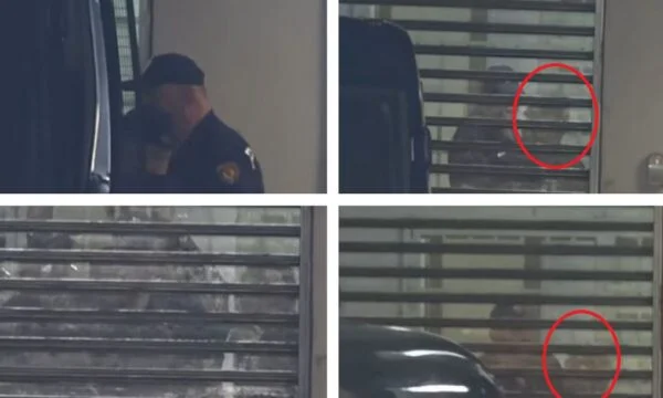 Umgeben von zahlreichen Polizeikräften kommt Ilir Meta vor Gericht