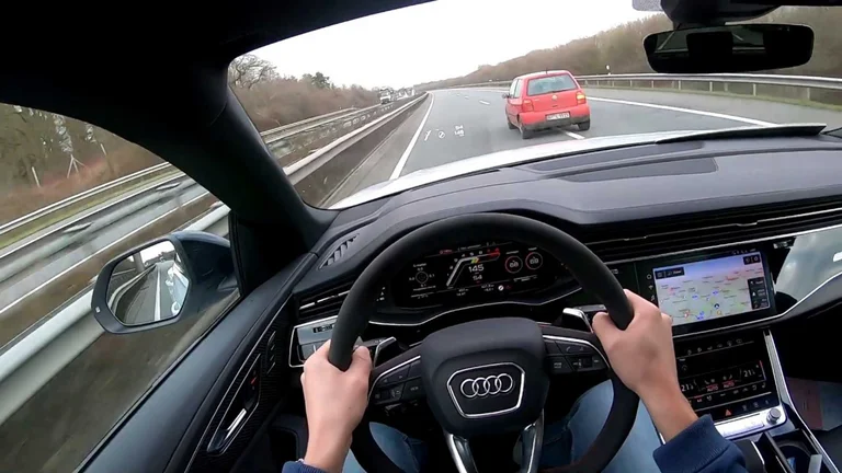 The traffic camera caught him racing with an Audi, the driver's picture became a hit in Germany