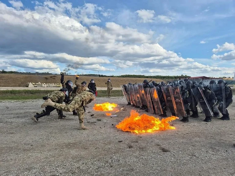 Albanian soldiers from contingent NATO conducted training to cope with fire-fear