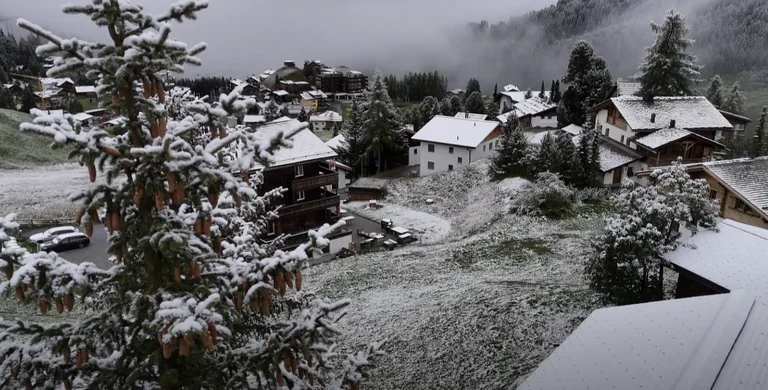 Snow falls in Switzerland in mid - September