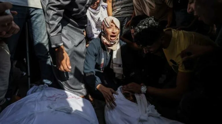 At least 30 killed by Israeli air strikes at a Gaza school
