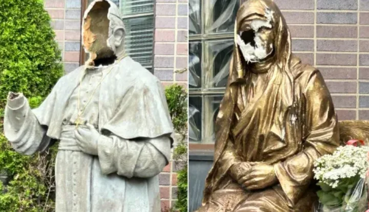 Vandals hammer out Pope's statues and Mother Teresa outside New York church