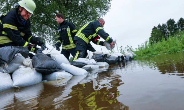Flooding in Germany, a fireman drowns in an effort to rescue residents