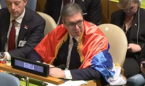 Vuchiki loses “top” following Srebrenica vote, wrapped with Serbian flag