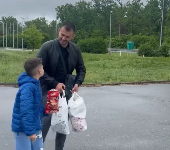 Labinot Tahiri takes water and food to Kosovars who were trapped at the Croatia-Serbia border, took several photos