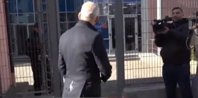 He was entering the JCKKO to take part in the Beler trial, Vanghel Dulae being shot with eggs