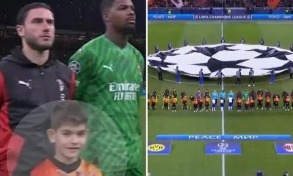 28 novembre: Il ragazzo fa un'aquila con le mani al Milan Dortmund match