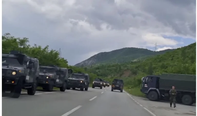 A column of KFOR military vehicles seen heading towards Zvecan