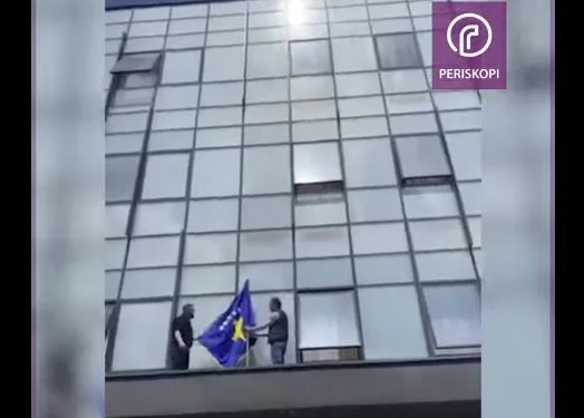 Kosovo flag deployed in northern Mitrovica building