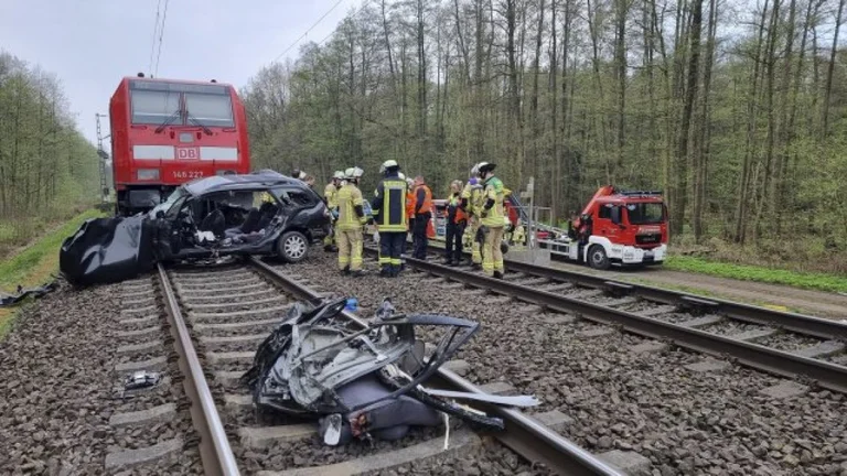 Train hits a car in Germany, at least three dead.