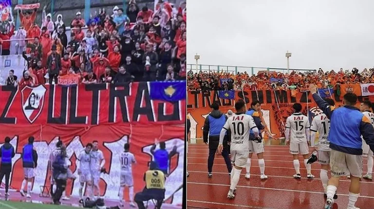 Les fans japonais montrent le drapeau du Kosovo à Tribuna