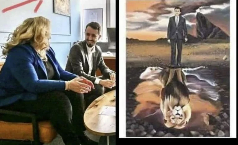 Der Vorsitzende von Kamenica hält das Gemälde mit Kurt, der sich in seinem Büro befindet.
