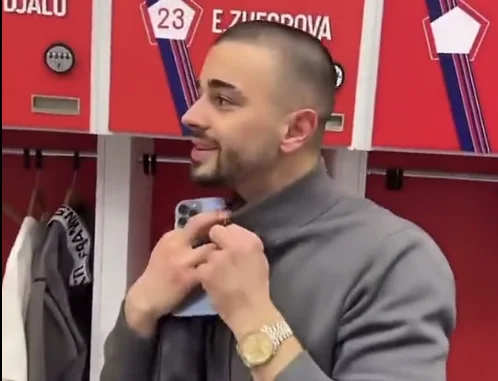 Edon Zegrova and his associates in a good mood in a strip store