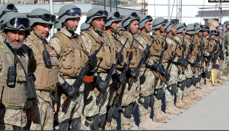 Soldiers of Afghan Special Units, who have fought in support of American troops, cross into Russian camp