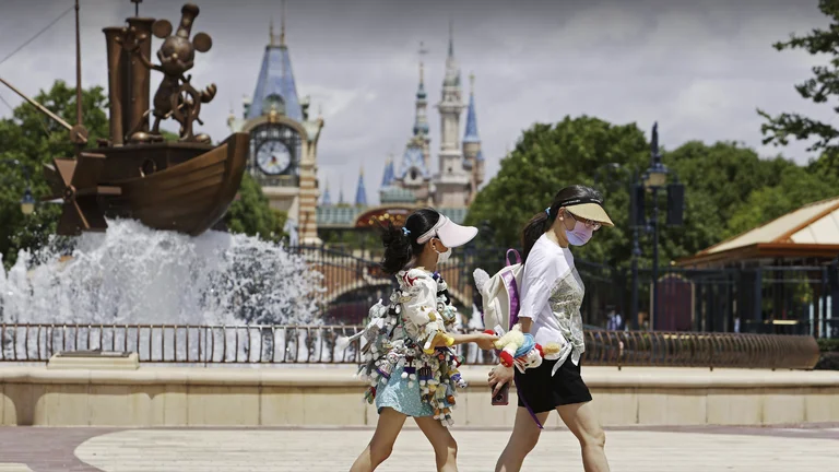 Visitors are trapped inside Disney in Shanghai, allowed to go without a negative COVID test.