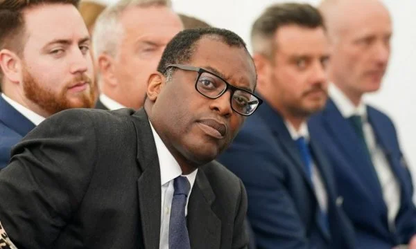Minister of Finance caught by camera laughing at Queen Elizabeth's funeral