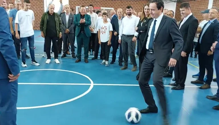 Kurt and Bullitch play soccer in Podujevo, as if nothing had happened.