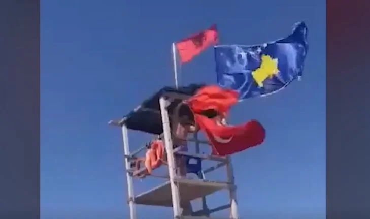Albanian sicken Turkish flag to wave, nervous and throw it into the sea
