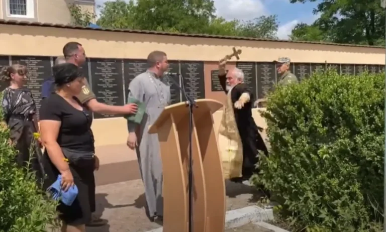 The Russian priest cannot stand the Ukrainian priest: Hit him with a cross.