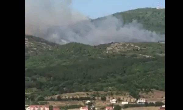 Mitrovica village mountains on fire