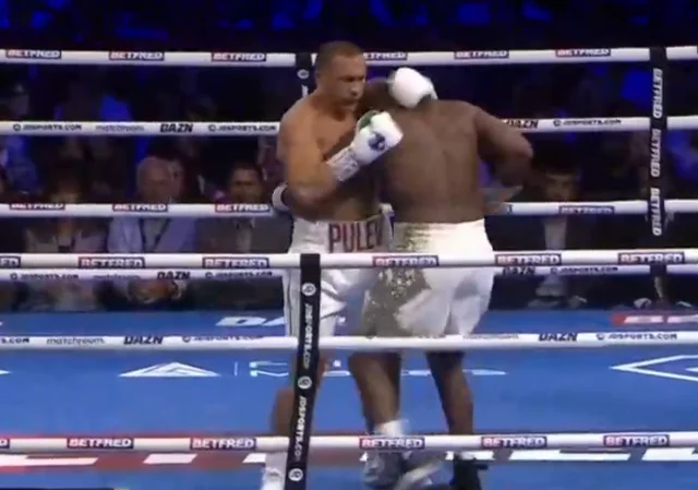 First round begins: Chisorah shows cunningness, strikes Pulev's ribs