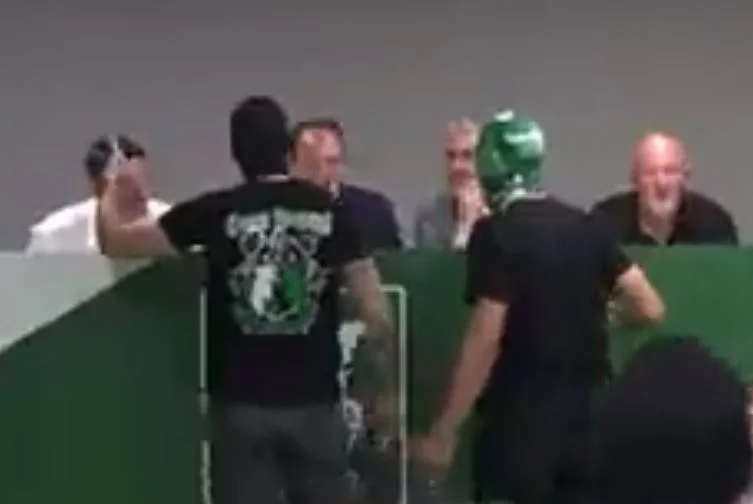 Crazyness happens with masks and screaming, Slovenian club ultras interrupt new coach's conference