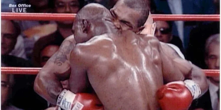 What happened to the earpiece that Tyson bit Hollyfield 25 years ago?