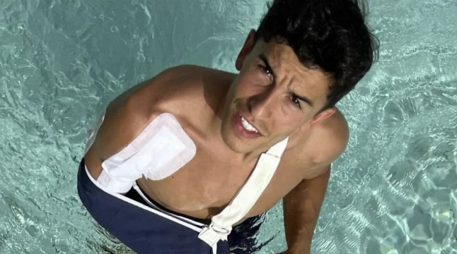 He performed four operations after the accident eight times the world champion shows the wound on his arm.