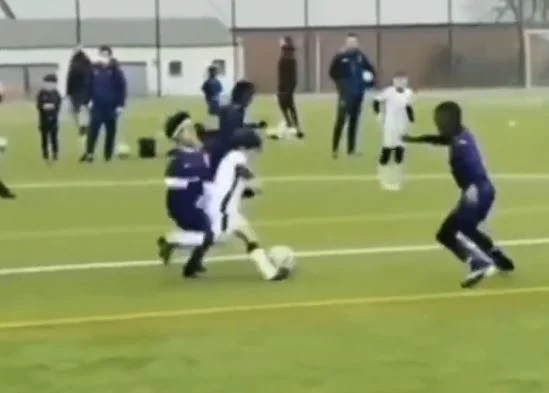 The boy of the unbelievable Mess. See how the ball can't get away from his leg.