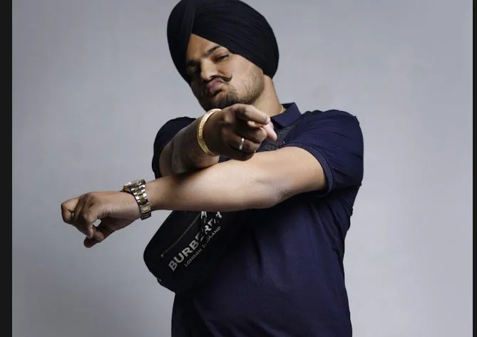 Shot in hail of bullets near the famous rapper home