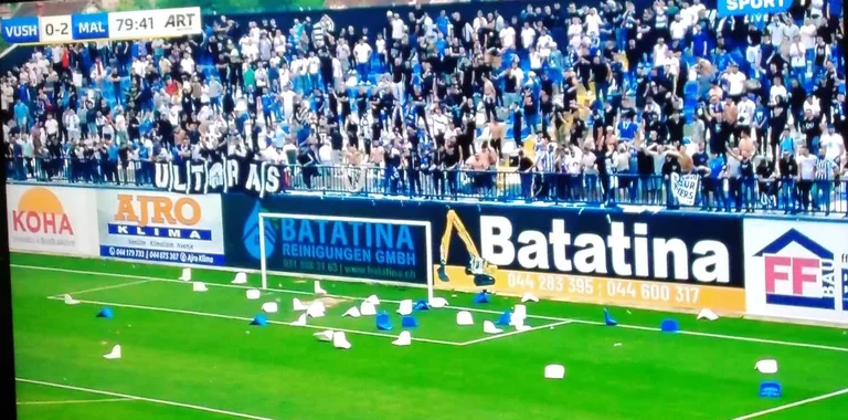 Firing Malisheva penalty, Vushtrri fans rip the net and throw seats into the field
