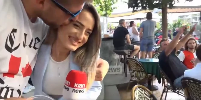 Reporting live, Feenoor fan küsstes Albanischer Journalist