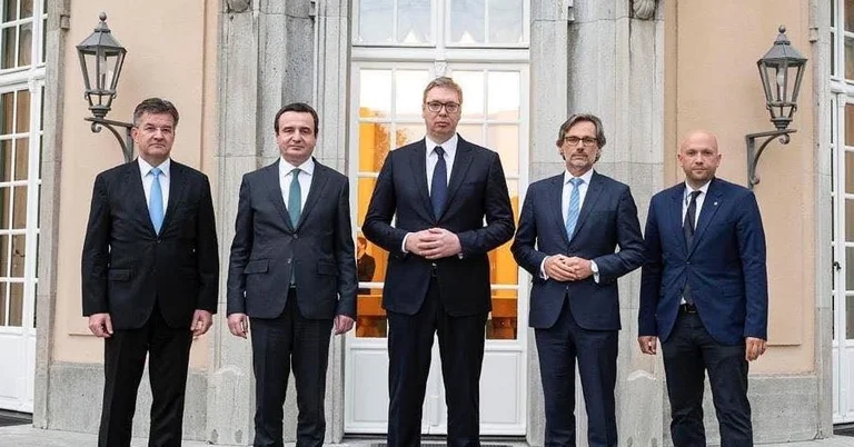 Three of them are getting recognized, but who are the two Germans in the famous picture?
